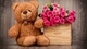 Картинка: Плюшевый медвежонок с букетом роз