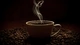 Картинка: Чашечка ароматного напитка стоит в зёрнах кофе