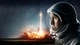 Картинка: Космонавт в скафандре на фоне взлетающей ракеты