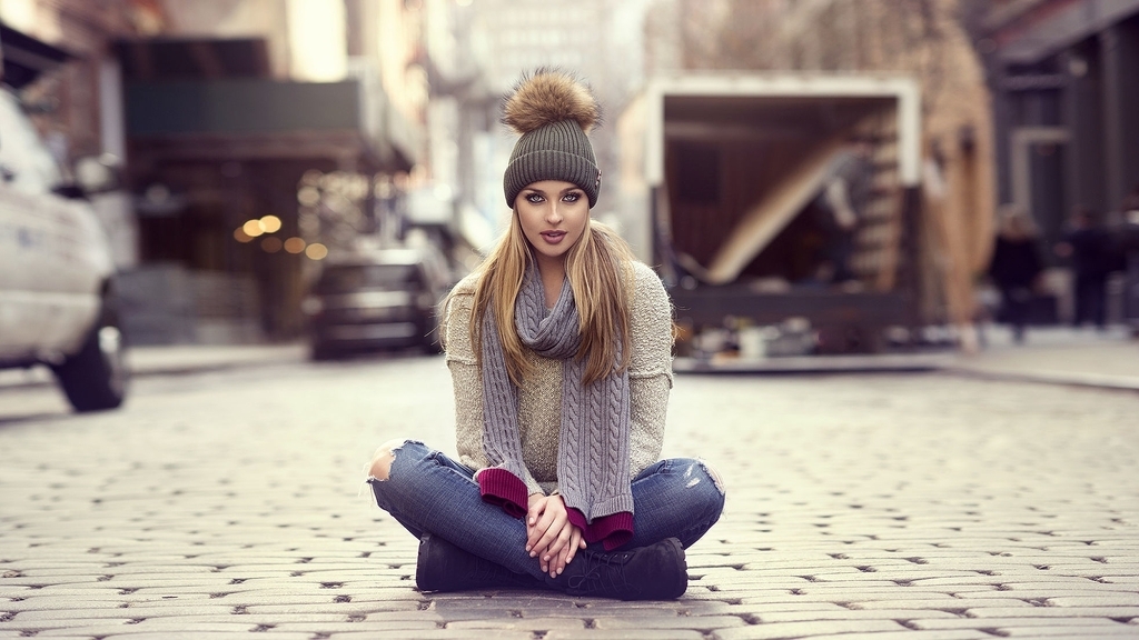 Image: Girl, blonde, sitting, hat, scarf, street, sidewalk