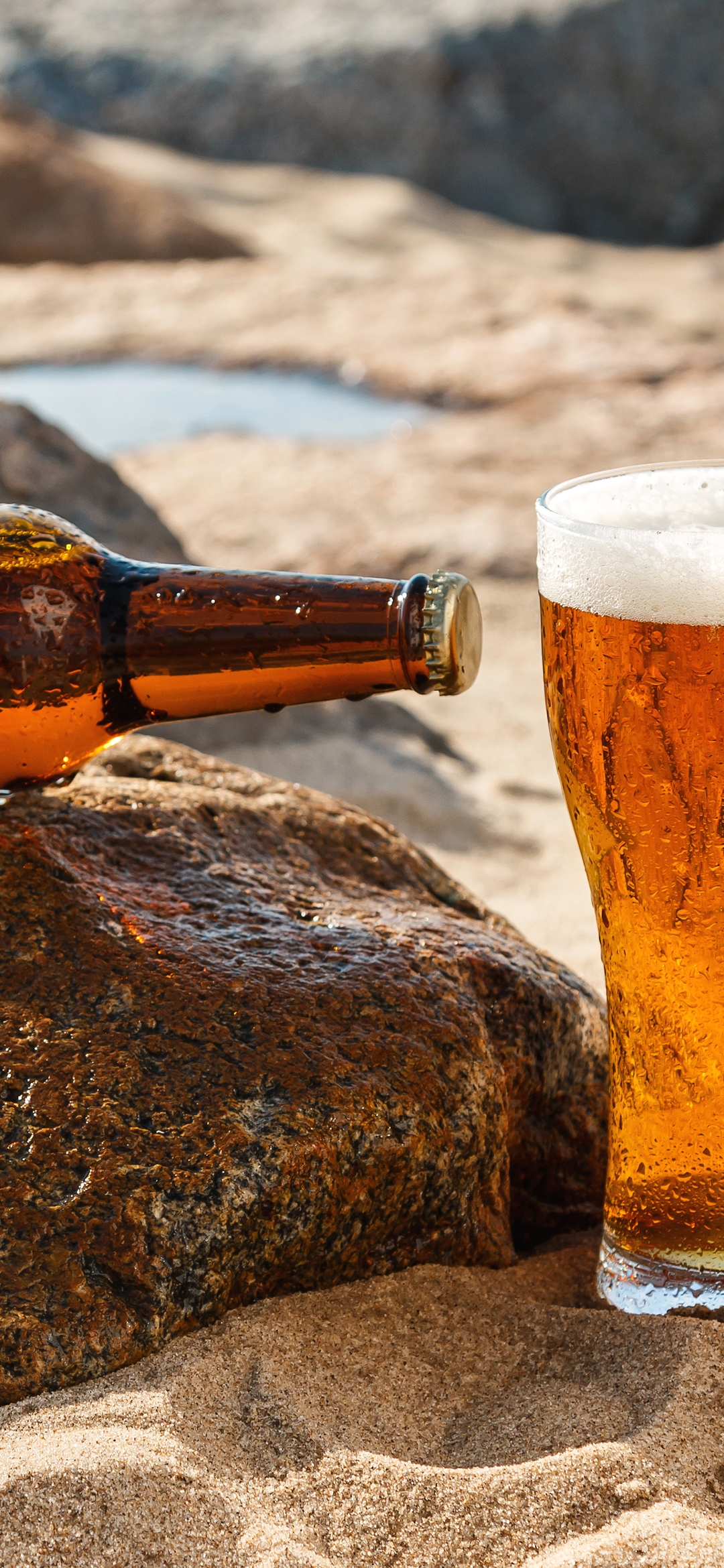 Image: Sand, stones, glass, bottles, beer