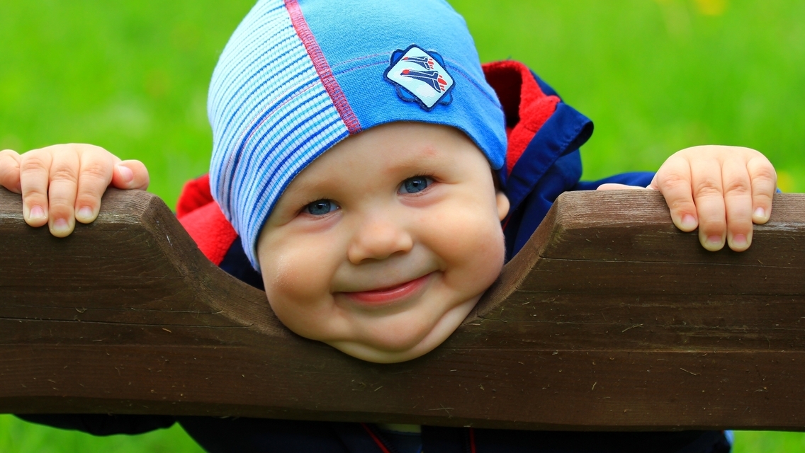 Image: Boy, kid, child, smile, mood, bench