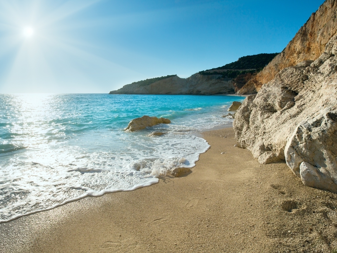 Image: Sea, water, coast, sand, stones, rocks, horizon, sky, sun, day
