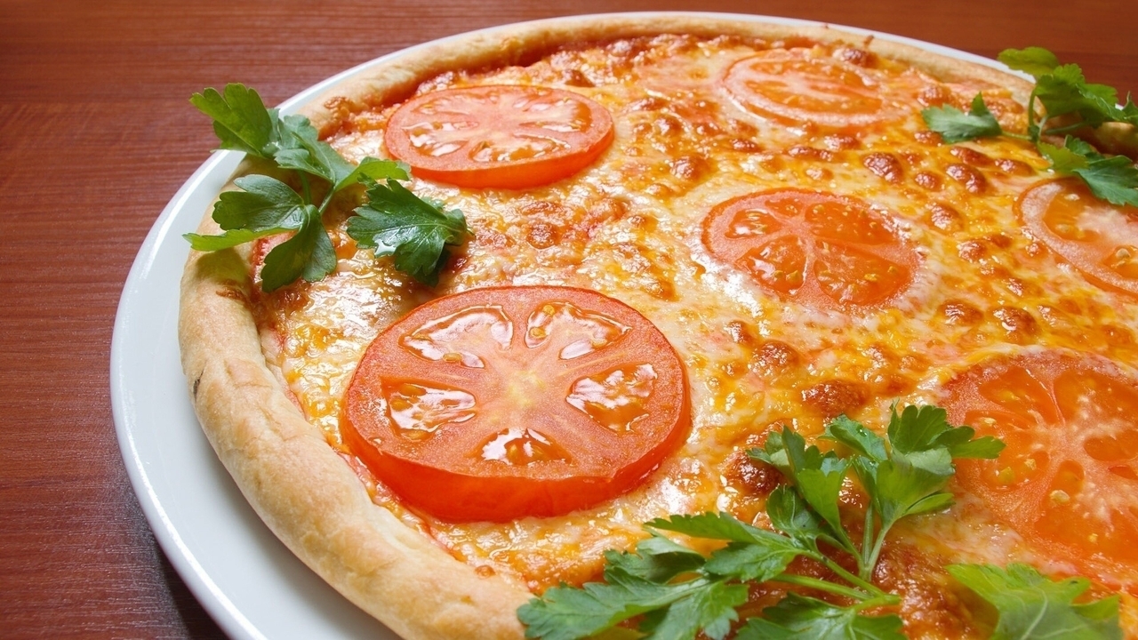 Image: Pizza, tomatoes, greens, pastries