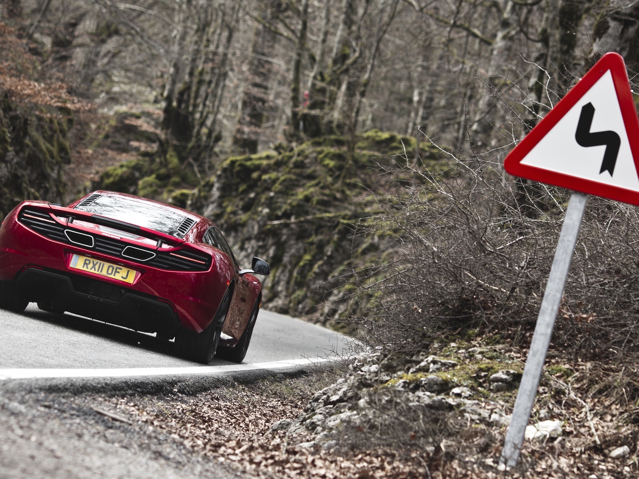 Image: McLaren, MP4, 12C, red, road, forest, warning, sign, dangerous turns