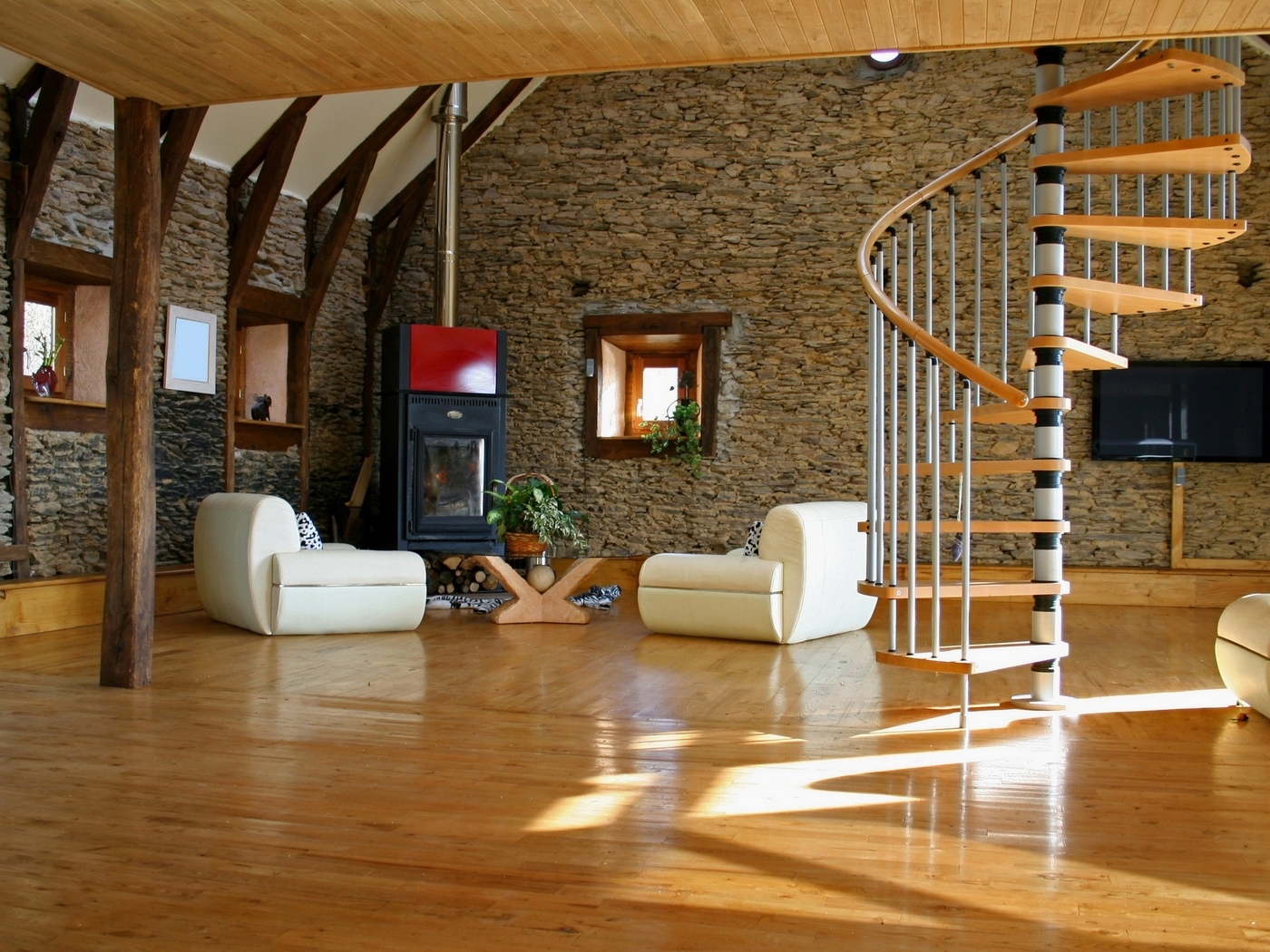 Image: Living room, stairs, chairs, TV, wall, floor, fireplace