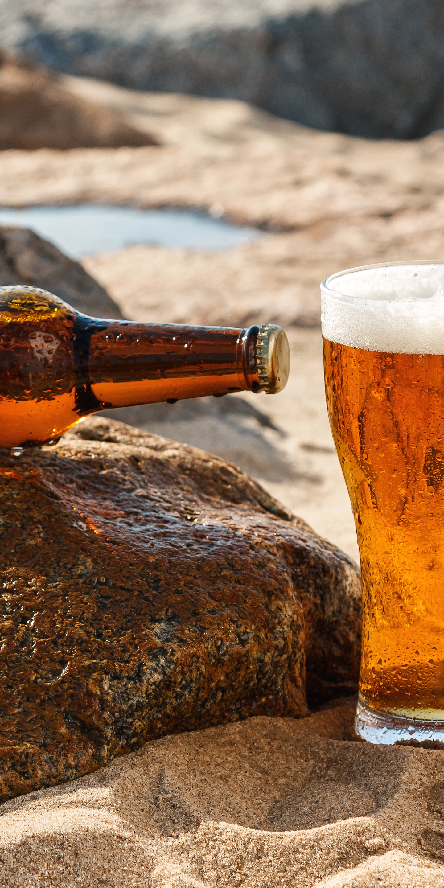 Image: Sand, stones, glass, bottles, beer