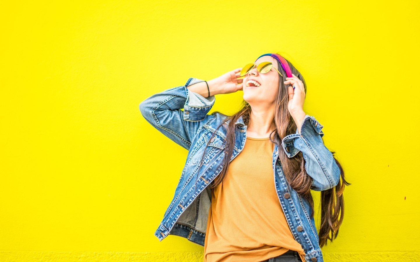 Image: Fun, mood, girl, glasses, jeans, yellow background