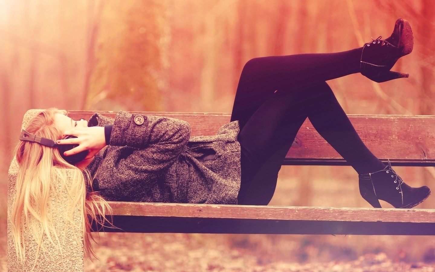 Image: Girl, headphones, lying, bench, park