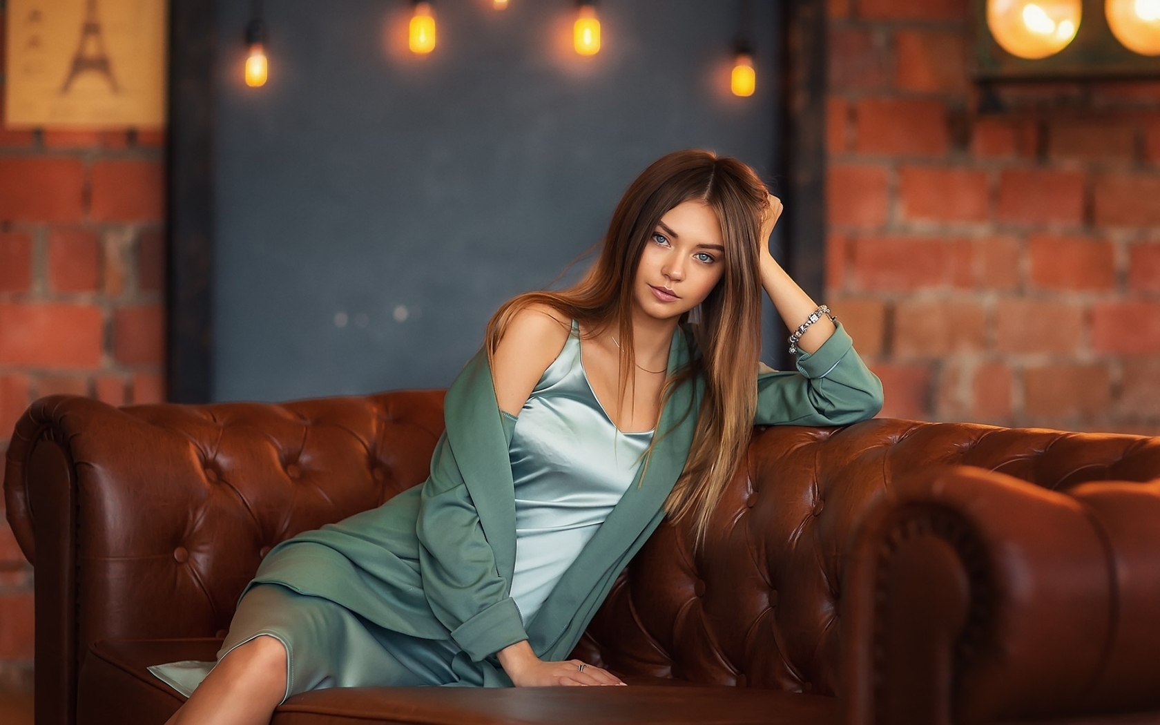 Image: Girl, long hair, pose, sofa, leather, lighting, lamp, wall, brick, Polina Kostyuk, model