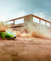 Картинка: Lamborghini, суперкар, пыль, скорость, здания, дрифт