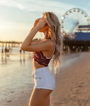 Image: girl, blonde, long hair, standing, watching, sand, beach, sunset