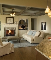 Картинка: Гостиная, комната, декор, камин, огонь, светильники, ковёр, диван, кресло, подсолнухи