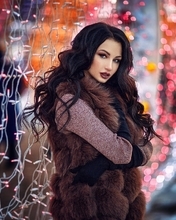Image: Girl, brunette, coat, vest, fur, garland, holiday, bokeh