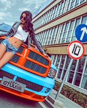 Image: Girl, asian, brunette, feet, glasses, car, street, sign