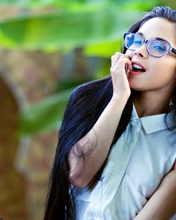 Image: Girl, long-haired, glasses, smile, look, sitting