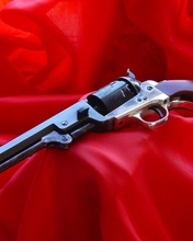 Image: Weapon, revolver, lying, fabric, red