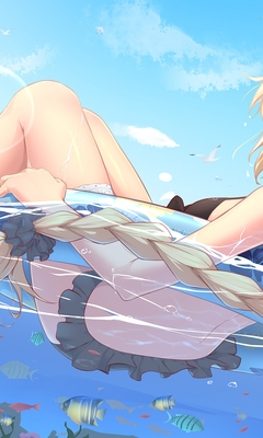Image: Girl, blonde, sea, swim, inflatable circle, fish