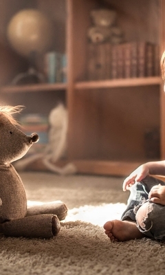 Image: Child, boy, toy, hedgehog, needles, room, game, sitting