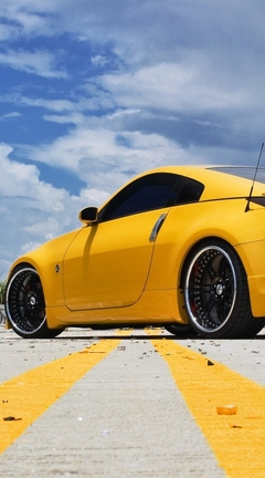 Image: Car, Nissan, 350Z, yellow, sky, clouds, road, garbage