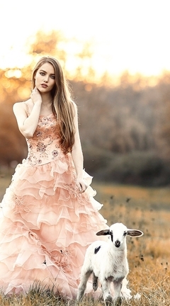 Image: Girl, long hair, dress, goat, field, sunset