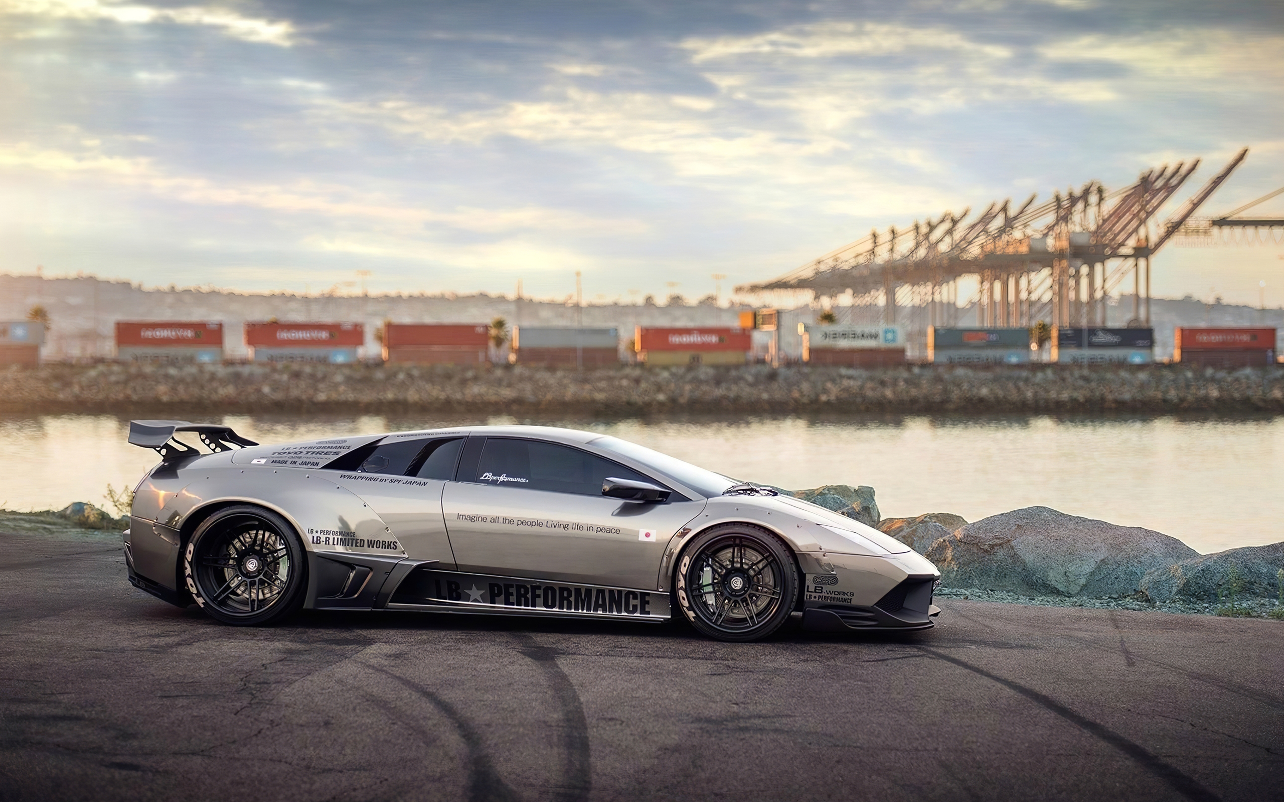 Картинка: Lamborghini, murcielago, LB Performance, суперкар, вода, порт, следы, контейнеры, краны, небо