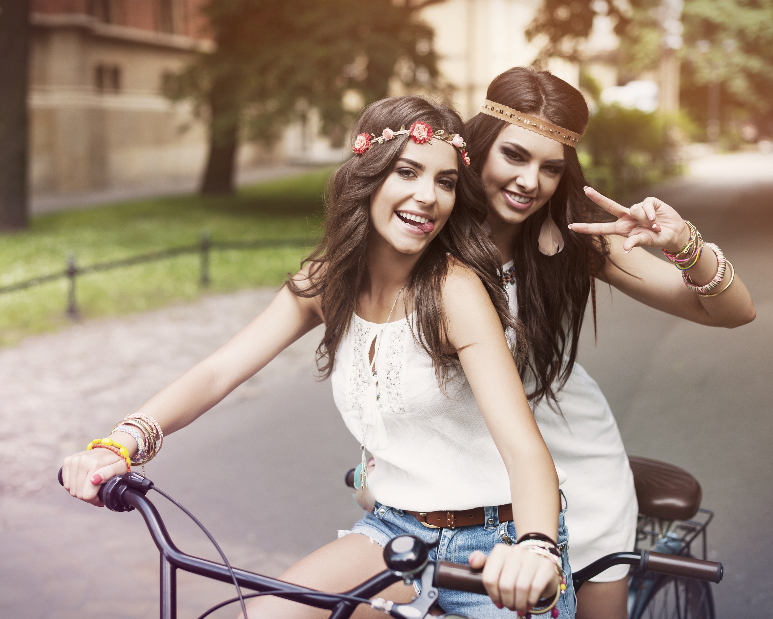 Image: Girl, bike, couple, two, ride, posing, goofing around