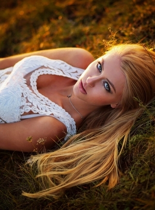 Image: Blonde, eyes, lies, grass, field, hair, sunset, white, girl