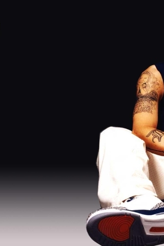 Image: Eminem, musician, rapper, floor, sitting, tattoo
