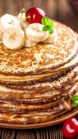 Image: Pancakes, bananas, berries, cherries