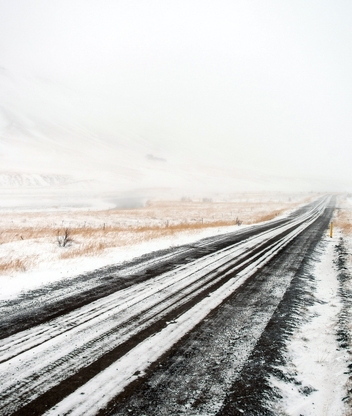Image: Road, winter, snow, field, fence, markers, grass, mountain, fog