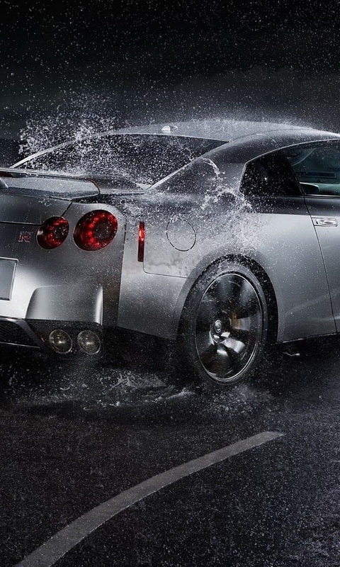 Картинка: Nissan GTR, брызги, дождь, дорога, скорость, поворот