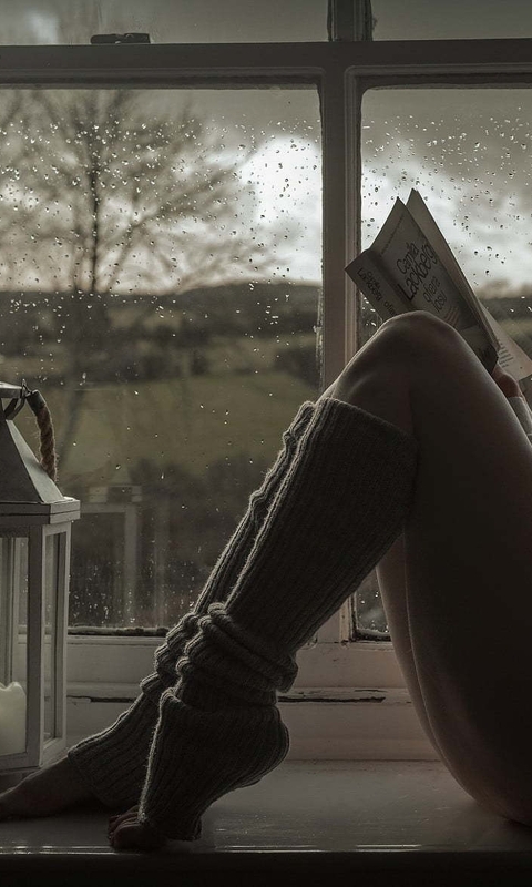 Image: Girl, sitting, reading, book, windowsill, window, rain, pillow