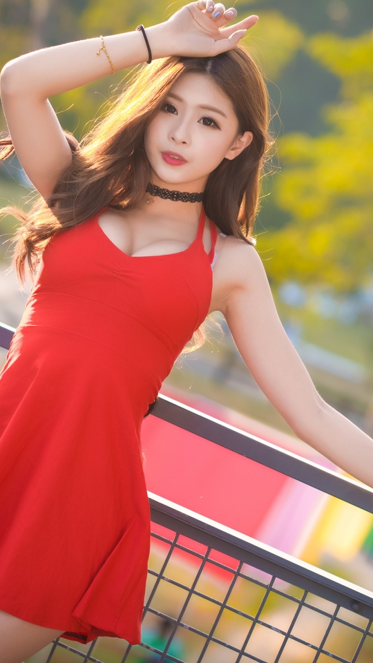 Image: Girl, Asian, hair, dress, red, fence, trees, blurring