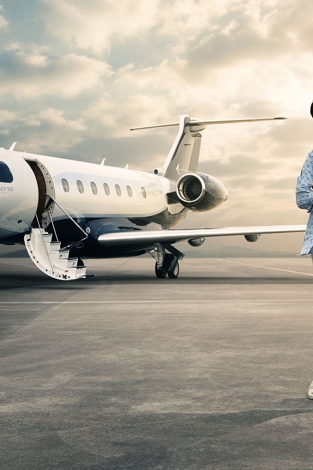 Image: Embraer Legacy 500, Jackie Chan, actor, man, standing, glasses, sky, clouds
