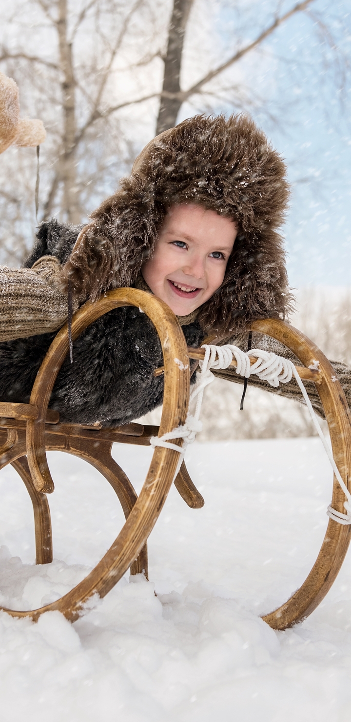 Image: Boys, children, hat, winter, snow, ride, sled, trees, smile, mood