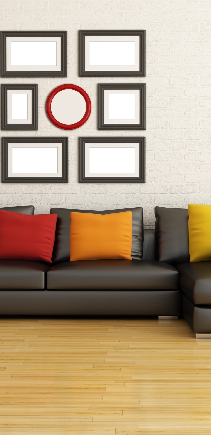 Image: Leather sofa, floor lamp, decorative pillows, planters, tree, wall, floor