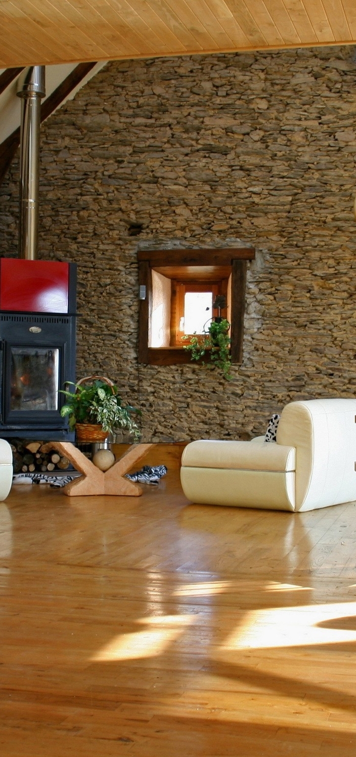 Image: Living room, stairs, chairs, TV, wall, floor, fireplace