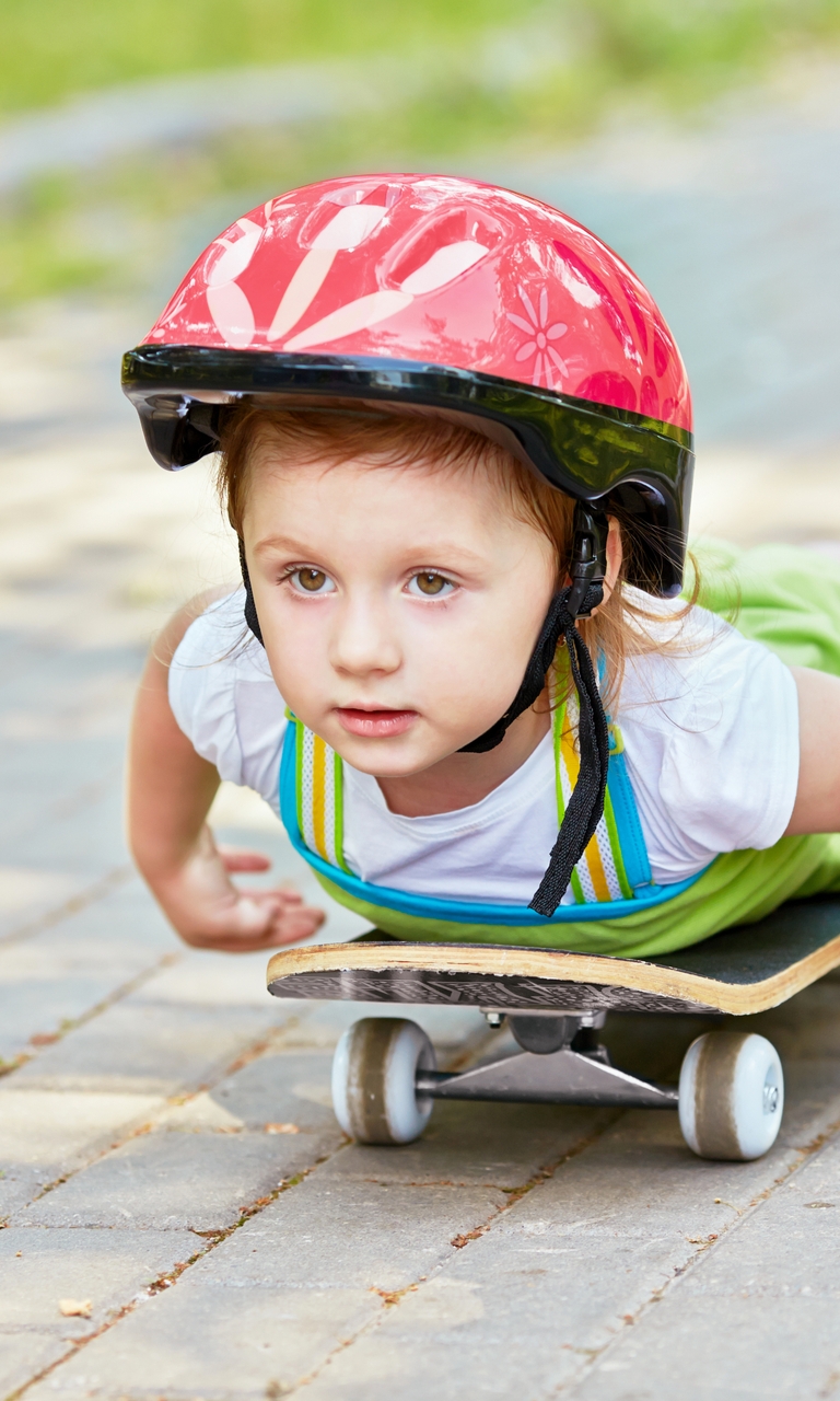 Image: Boy, child, skating, skate, helmet, lying