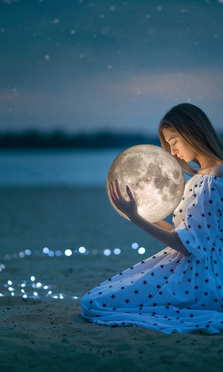 Image: Girl, dress, sitting, sand, globe, sphere, planet, moon, lights, keeps