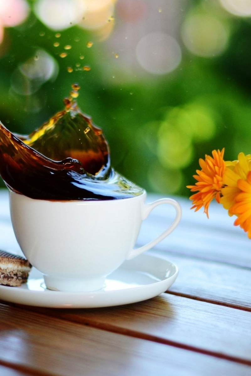 Image: A Cup of coffee, splash, spray, cake, flowers, table
