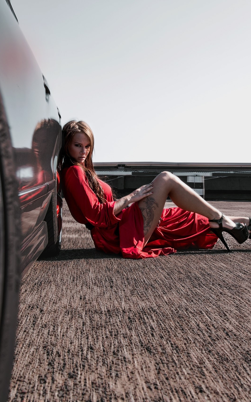 Image: Brunette, girl, Veronika Wonka, red dress, tattoo, legs, heels, sits, look, machine, asphalt