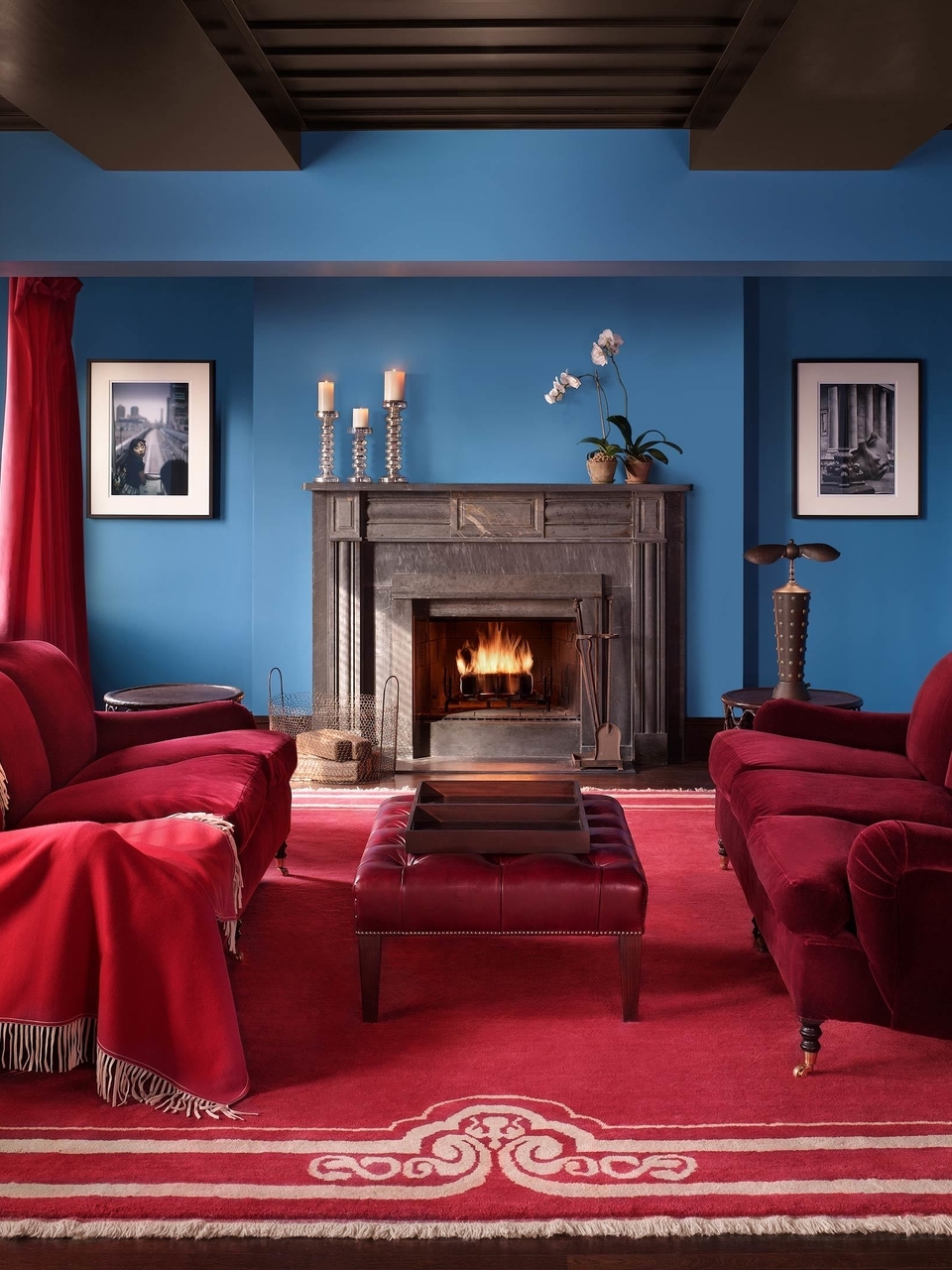 Image: Living room, red color, fireplace, floor lamp, sofa